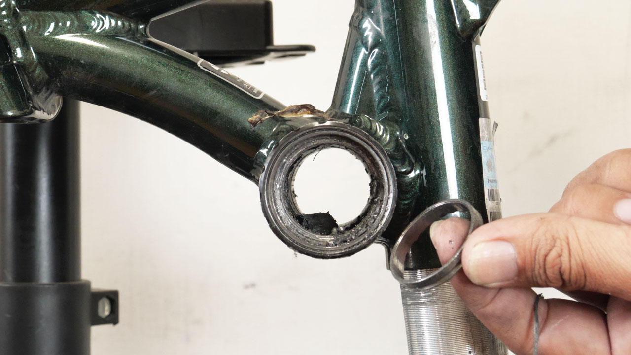 Completely destroyed BB cup bearing - mechanical failure from extreme schedule