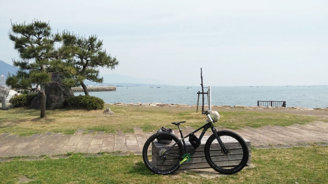 Lake Biwa shoreline with mountains in background - Japan's largest lake