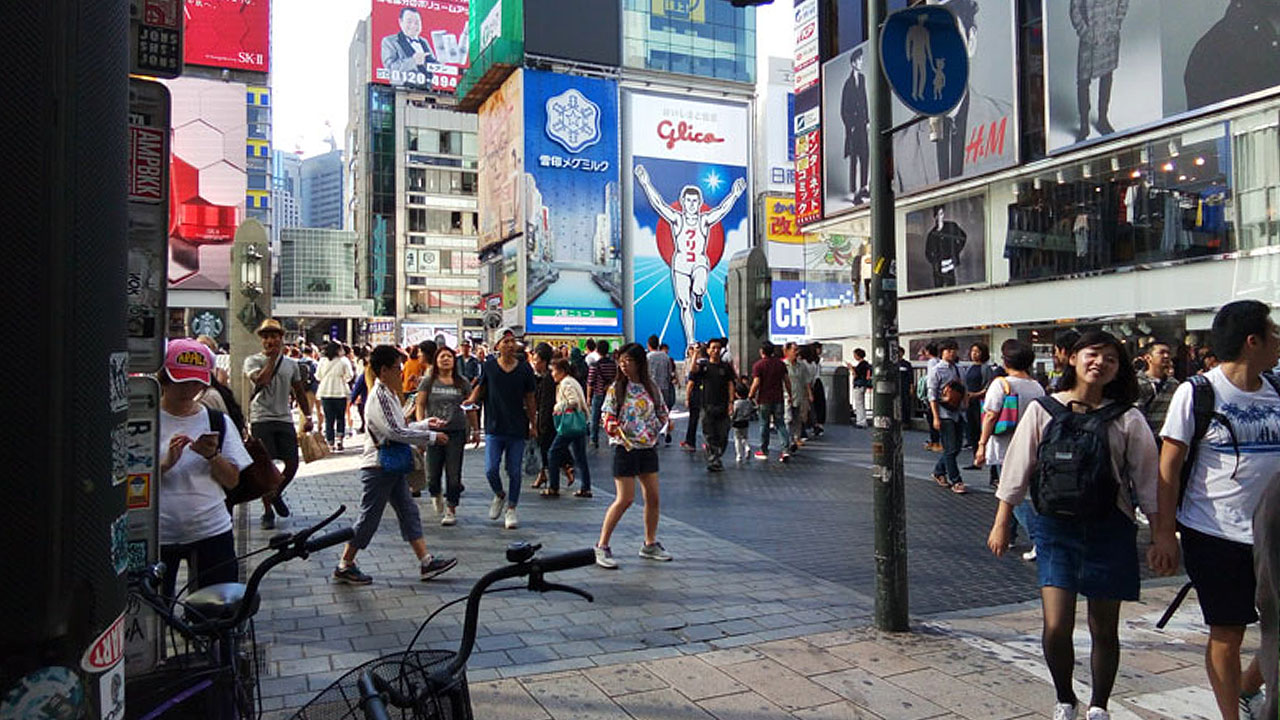 The famous Glico Running Man sign in Dotonbori - Osaka's most iconic neon landmark