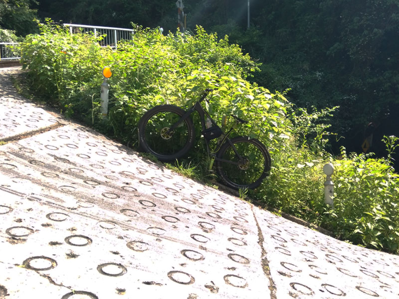 The infamous sweeping hairpin curve of Kuragari Pass, reaching 37% gradient