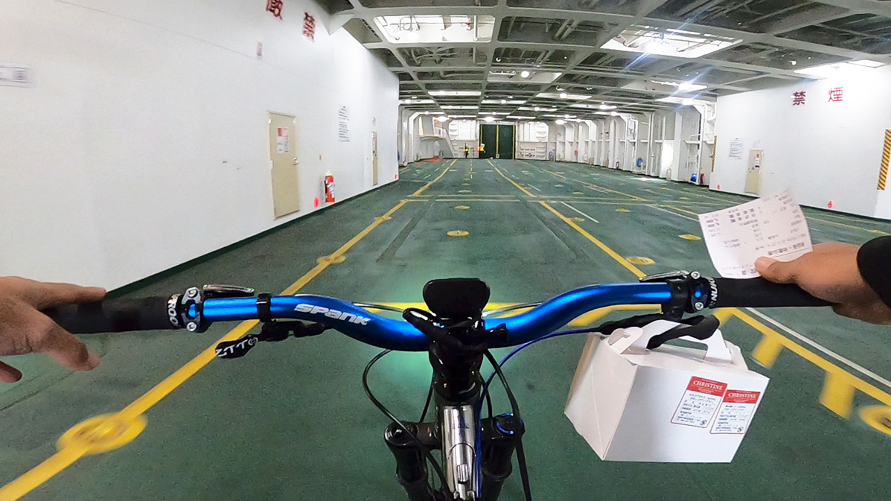 Bicycle loaded on Nankai Ferry deck - no disassembly required, just roll aboard