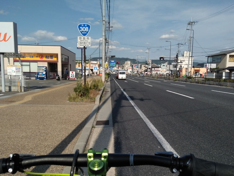 A wide, normal, flat inner city road