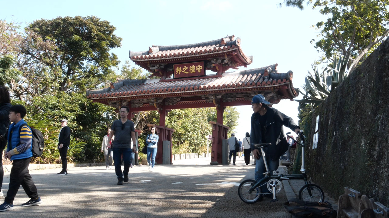 Shureimon Gate, the iconic entrance to Shuri Castle in Naha, Okinawa - traditional Ryukyuan architecture with red tiles and Chinese-style design