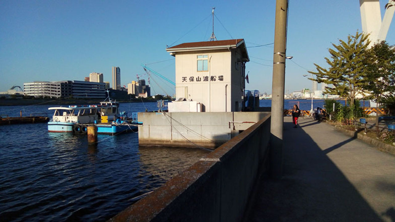 Ferry passengers heading to USJ on Sakurajima - many foreign workers
