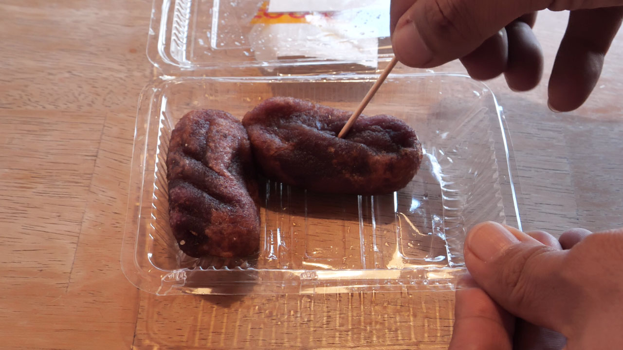 Umukuzi tempura - golden fried sweet potato fritters on a plate